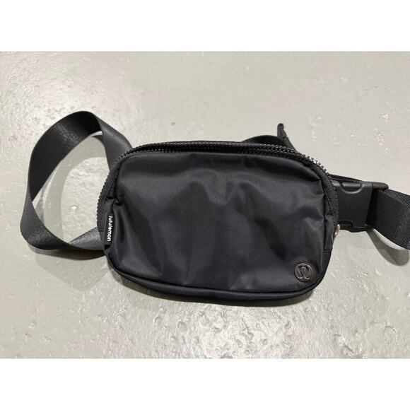 lululemon athletica Handbags - Lululemon Everywhere Belt Bag, specifically the 1L model in black
